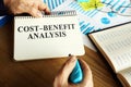 CostÃ¢â¬âbenefit analysis CBA or BCA on the table Royalty Free Stock Photo